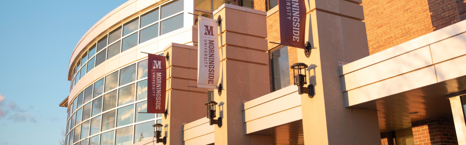 up close photo of the Morningside banner flags on the campus learning center.