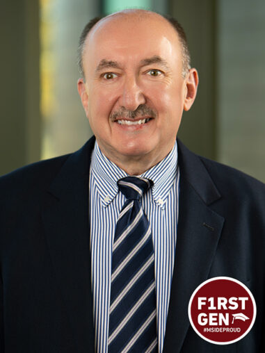 Headshot of Mark O'Connell with first gen badge