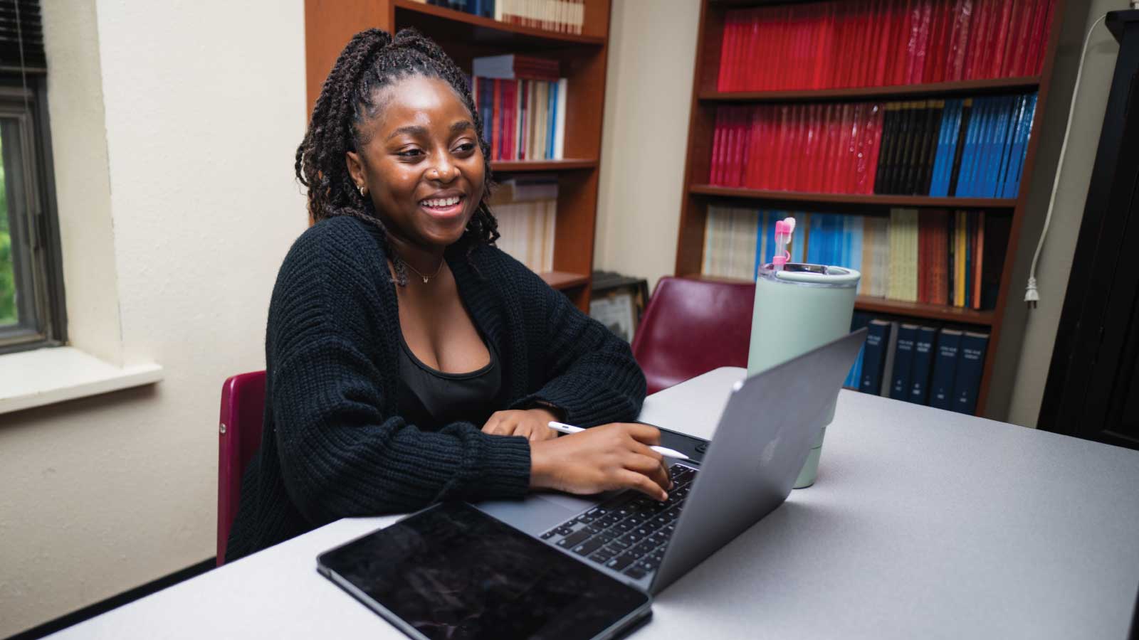 student smiling in class